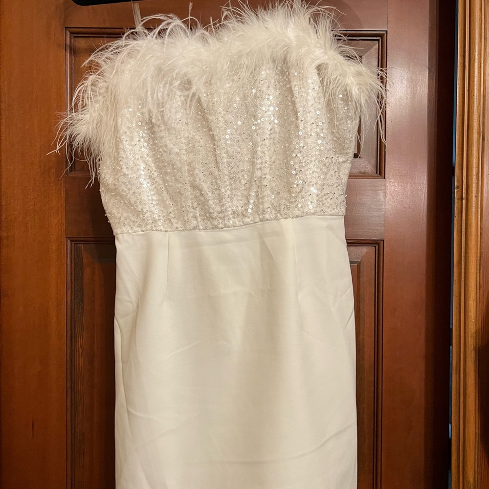 White sequin and feather dress
